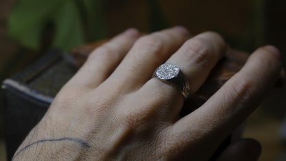 Rugged round sterling silver signet ring with handmade sand-cast texture