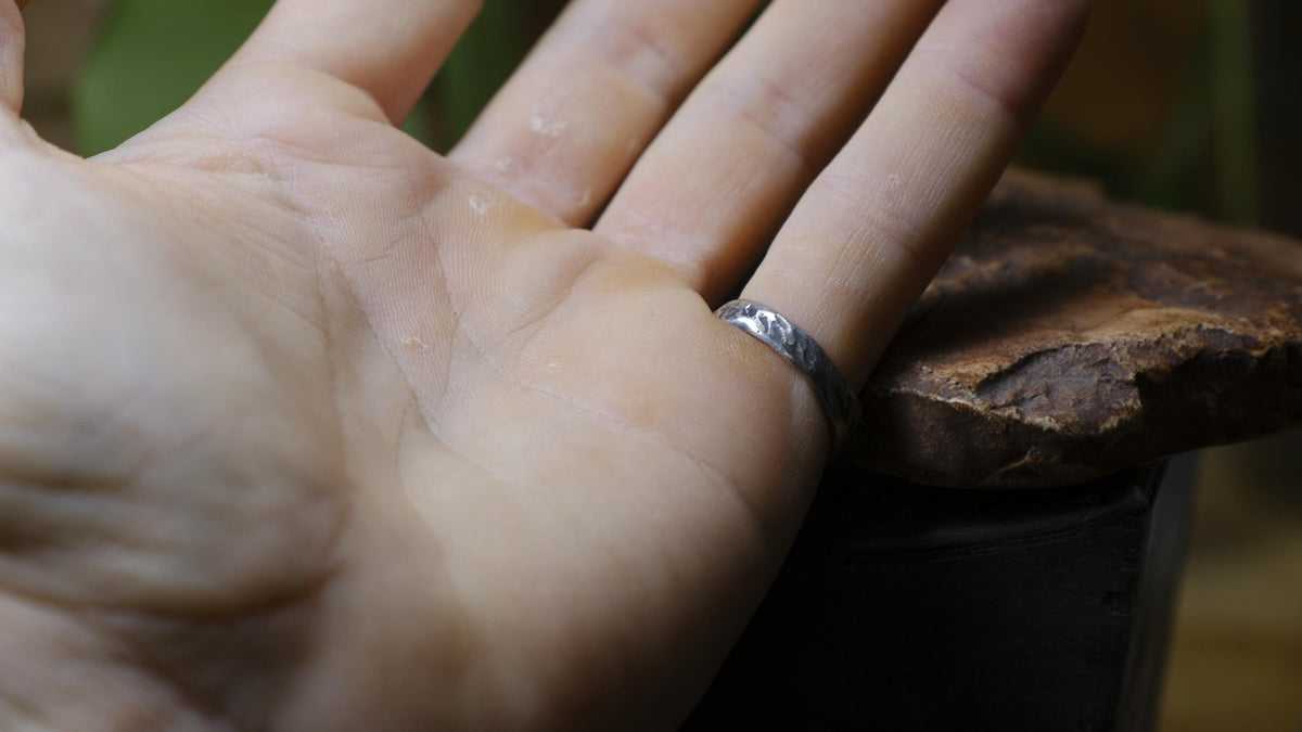 Rugged round sterling silver signet ring with handmade sand-cast texture