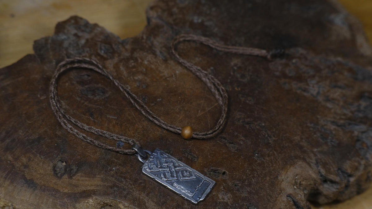 The Endless Knot or Shrivatsa Temple Relic Talisman Pendant in Sterling Silver on Adjustable Cord
