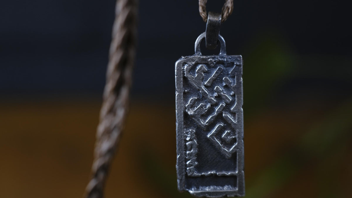 The Endless Knot or Shrivatsa Temple Relic Talisman Pendant in Sterling Silver on Adjustable Cord