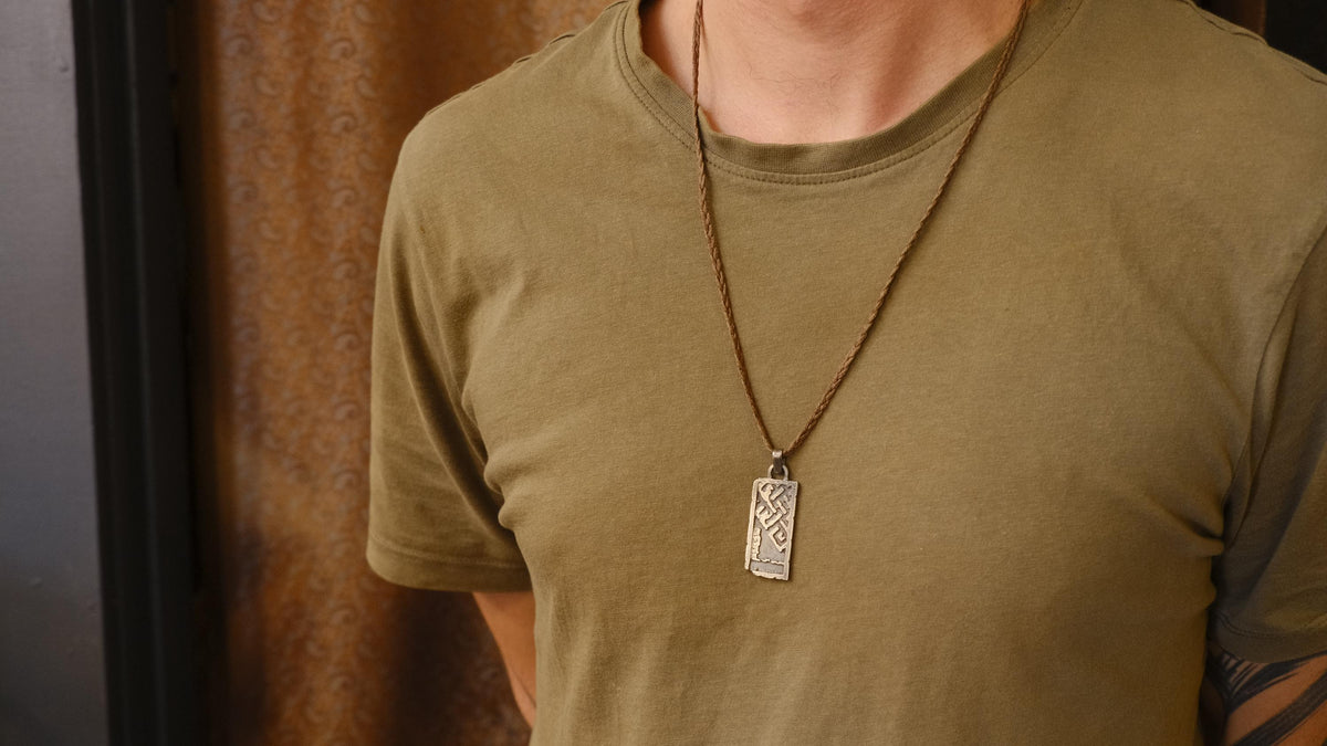 The Endless Knot or Shrivatsa Temple Relic Talisman Pendant in Sterling Silver on Adjustable Cord