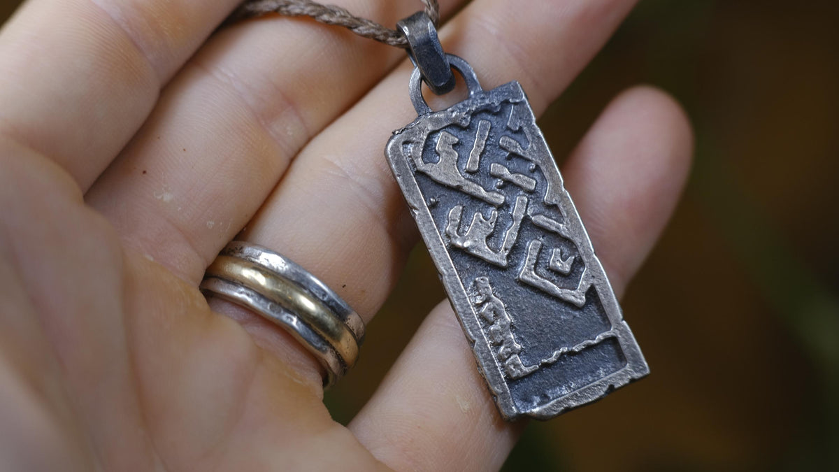 The Endless Knot or Shrivatsa Temple Relic Talisman Pendant in Sterling Silver on Adjustable Cord