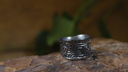 Delta Egyptian-inspired wide sterling silver ring with irregular textured band