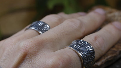 Delta Egyptian-inspired wide sterling silver ring with irregular textured band