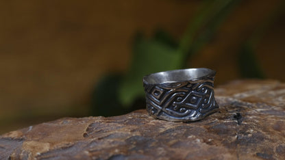 Delta Egyptian-inspired wide sterling silver ring with irregular textured band