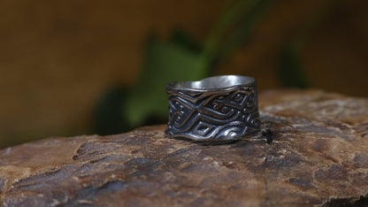 Delta Egyptian-inspired wide sterling silver ring with irregular textured band