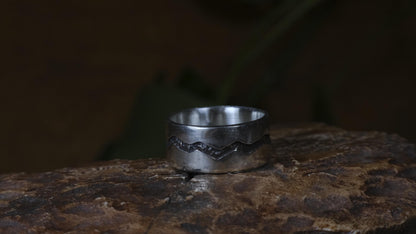 The Ridge wide sterling silver ring with mountain-inspired textured oxidised centre