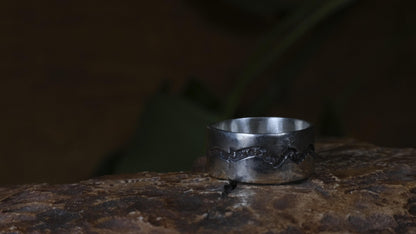 The Ridge wide sterling silver ring with mountain-inspired textured oxidised centre