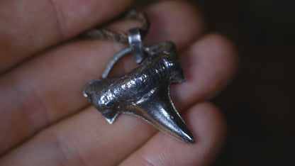 Sterling silver shark tooth talisman cast from a genuine fossil tooth on adjustable cord