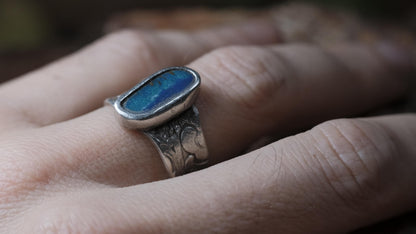 Blue Australian boulder opal ring in pirate-inspired textured sterling silver, size 7