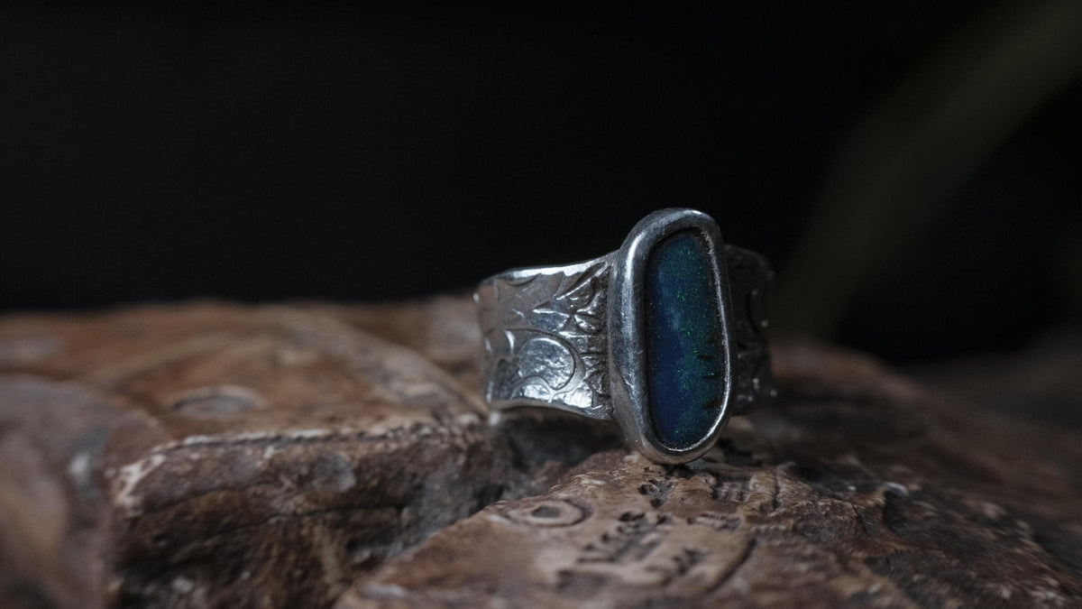 Blue Australian boulder opal ring in pirate-inspired textured sterling silver, size 7