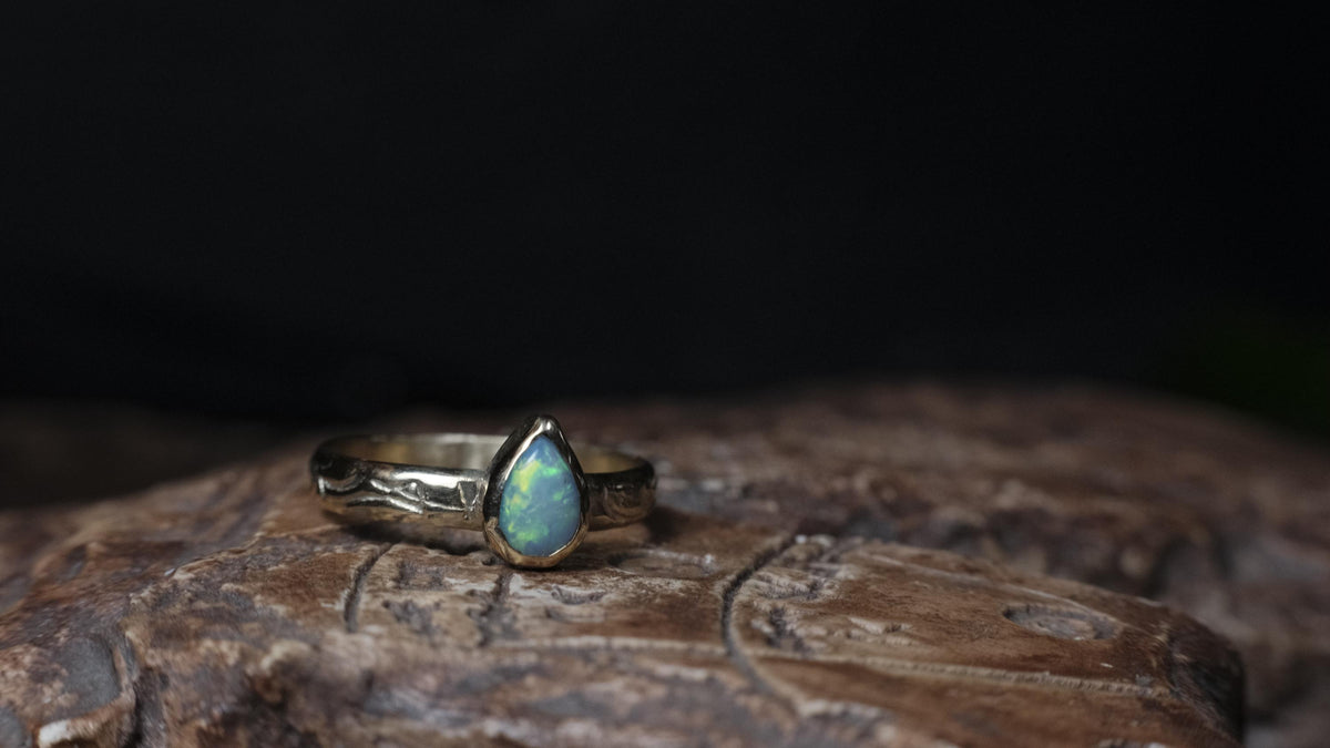 Lightning Ridge crystal opal ring in 9ct yellow gold, front view