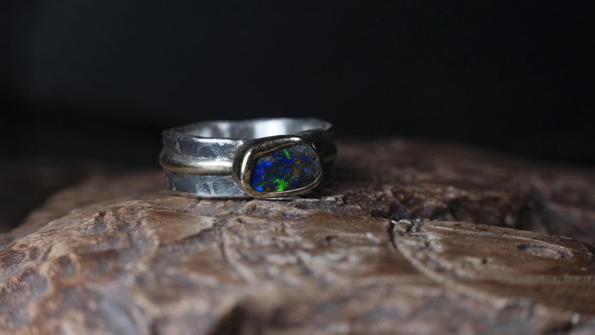 9ct gold bezel detail on Australian boulder opal and silver ring