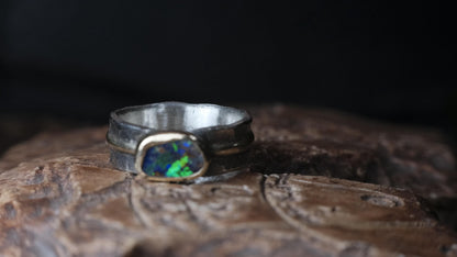 Australian boulder opal ring showing rich blue and green colour