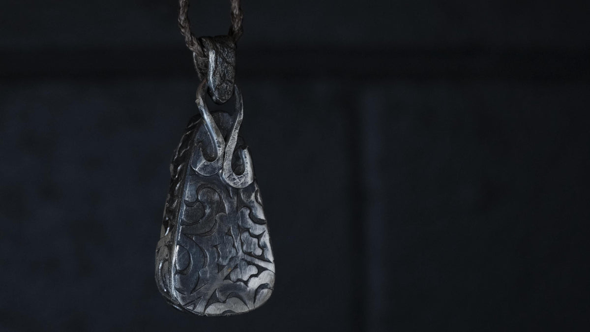 Close-up of Yowah matrix boulder opal in sterling silver setting