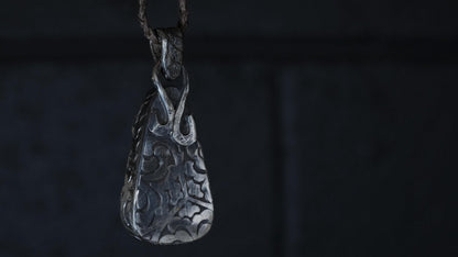 Close-up of Yowah matrix boulder opal in sterling silver setting