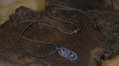 Handmade sterling silver Serpentine Temple Relic talisman with ancient serpent motif