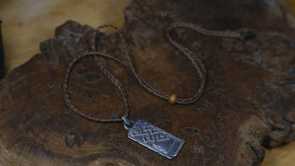 Handmade sterling silver Endless Knot Temple Relic talisman on adjustable cord