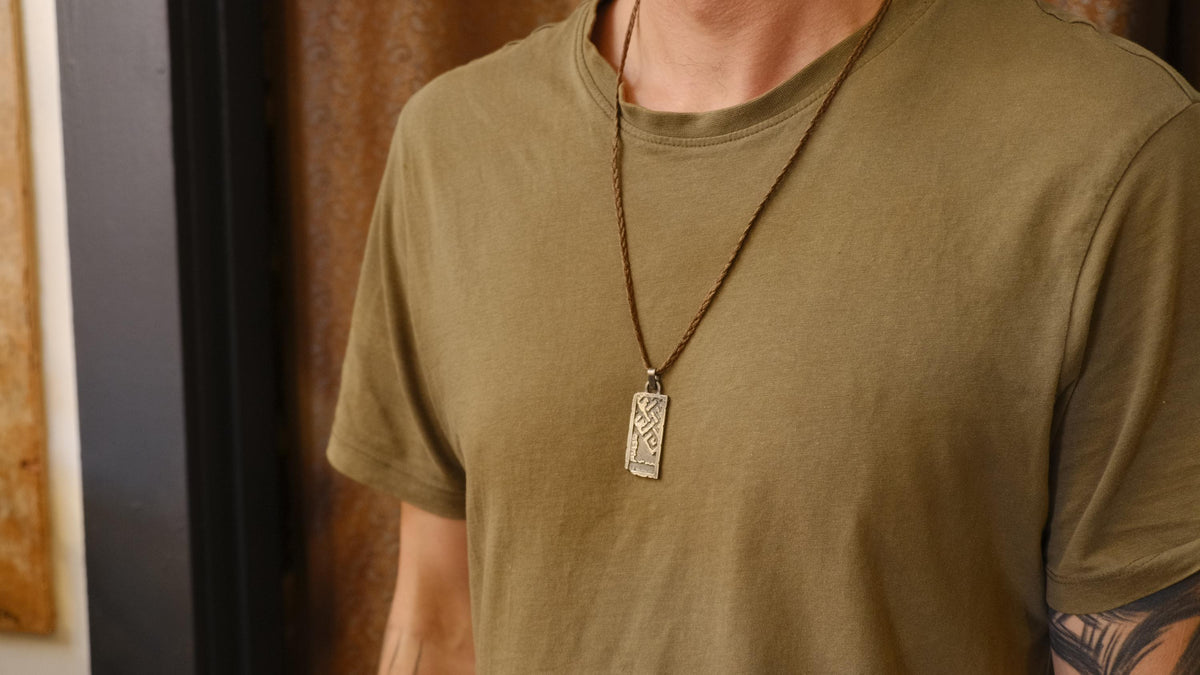 The Endless Knot or Shrivatsa Temple Relic Talisman Pendant in Sterling Silver on Adjustable Cord