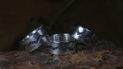 The Ridge wide sterling silver ring with mountain-inspired textured oxidised centre
