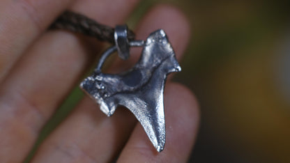 Sterling silver shark tooth talisman cast from a genuine fossil tooth on adjustable cord