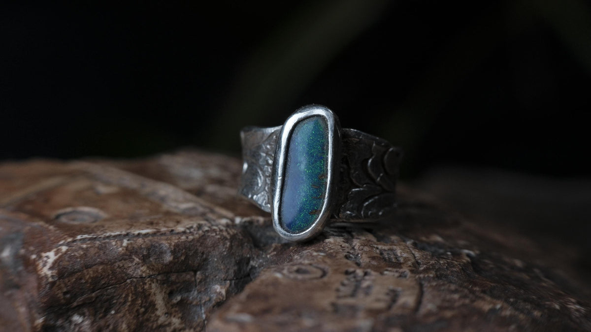 Blue Australian boulder opal ring in pirate-inspired textured sterling silver, size 7