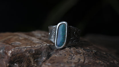 Blue Australian boulder opal ring in pirate-inspired textured sterling silver, size 7
