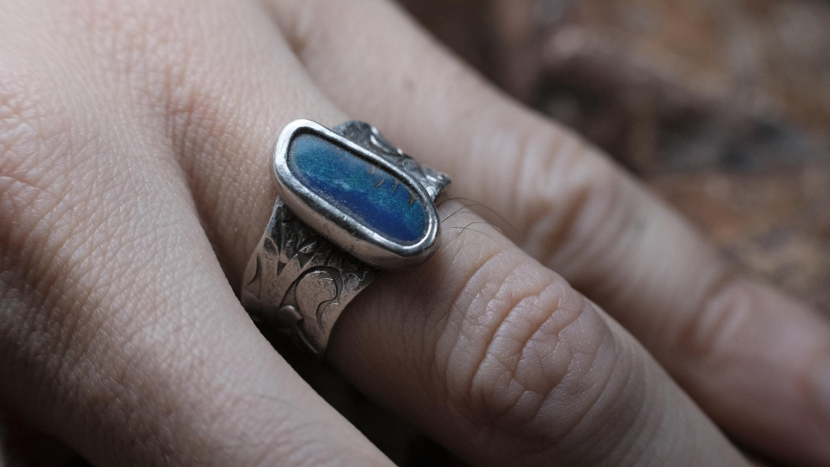 Blue Australian boulder opal ring in pirate-inspired textured sterling silver, size 7