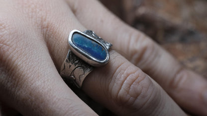Blue Australian boulder opal ring in pirate-inspired textured sterling silver, size 7