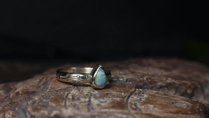 9ct yellow gold ring with Lightning Ridge crystal opal, angled front view