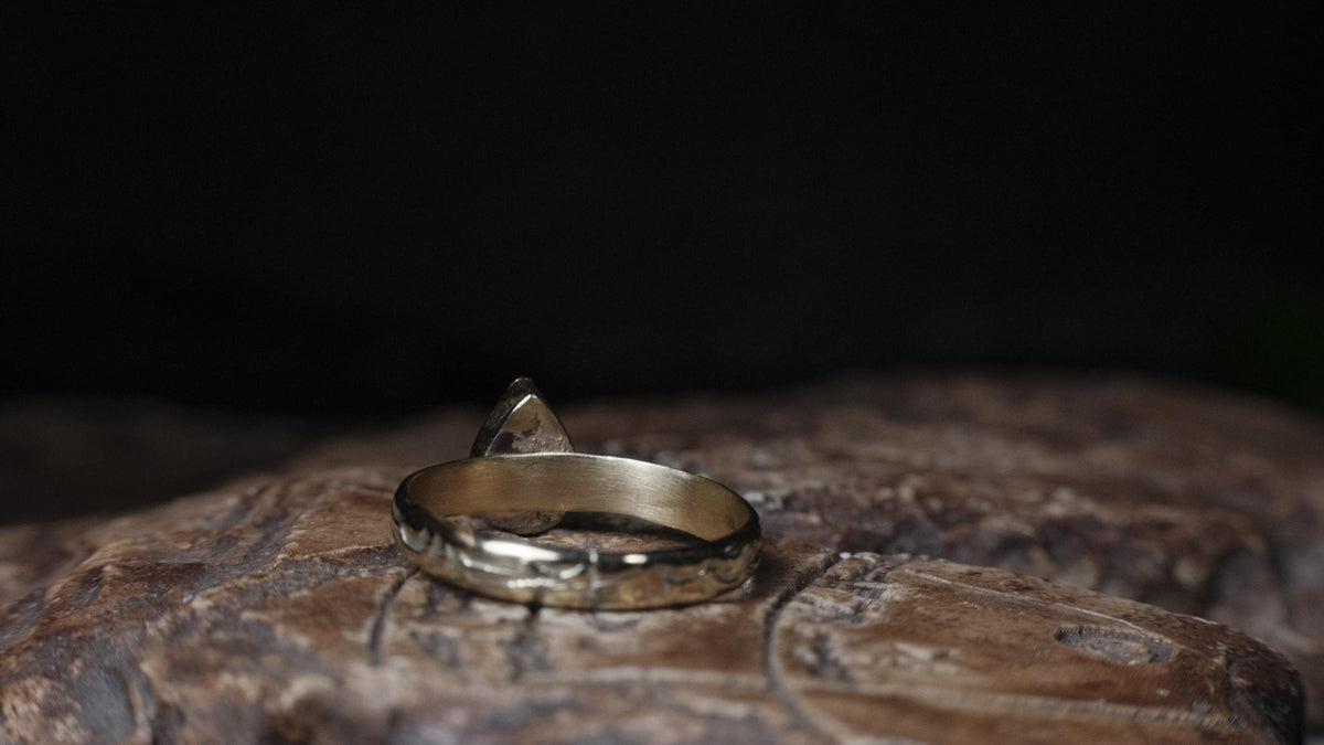 Inside view of the gold ring band and crystal opal setting