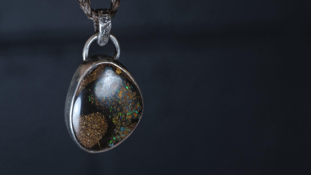 Pirate-inspired textured sterling silver Yowah opal pendant