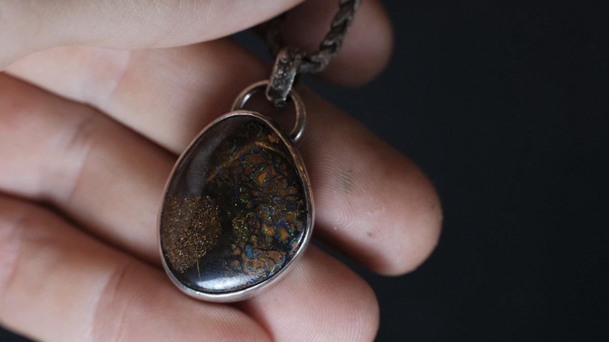 Handmade sterling silver setting for Yowah boulder opal