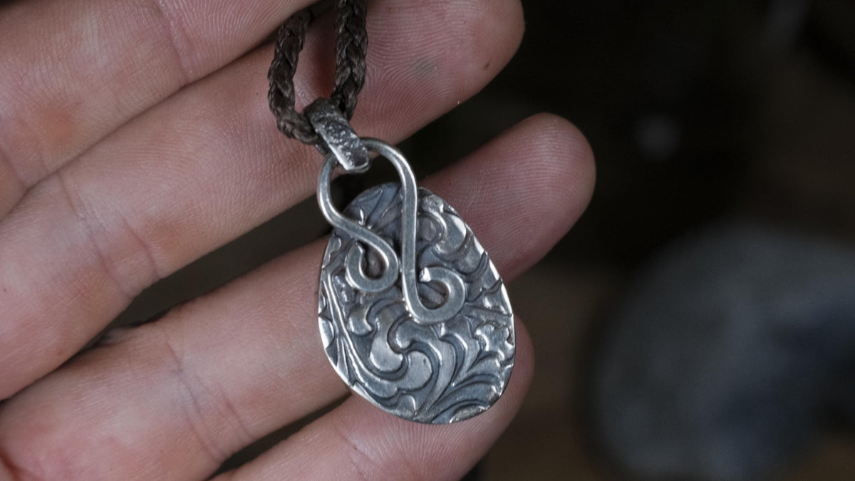 Australian opal pendant with textured sterling silver back