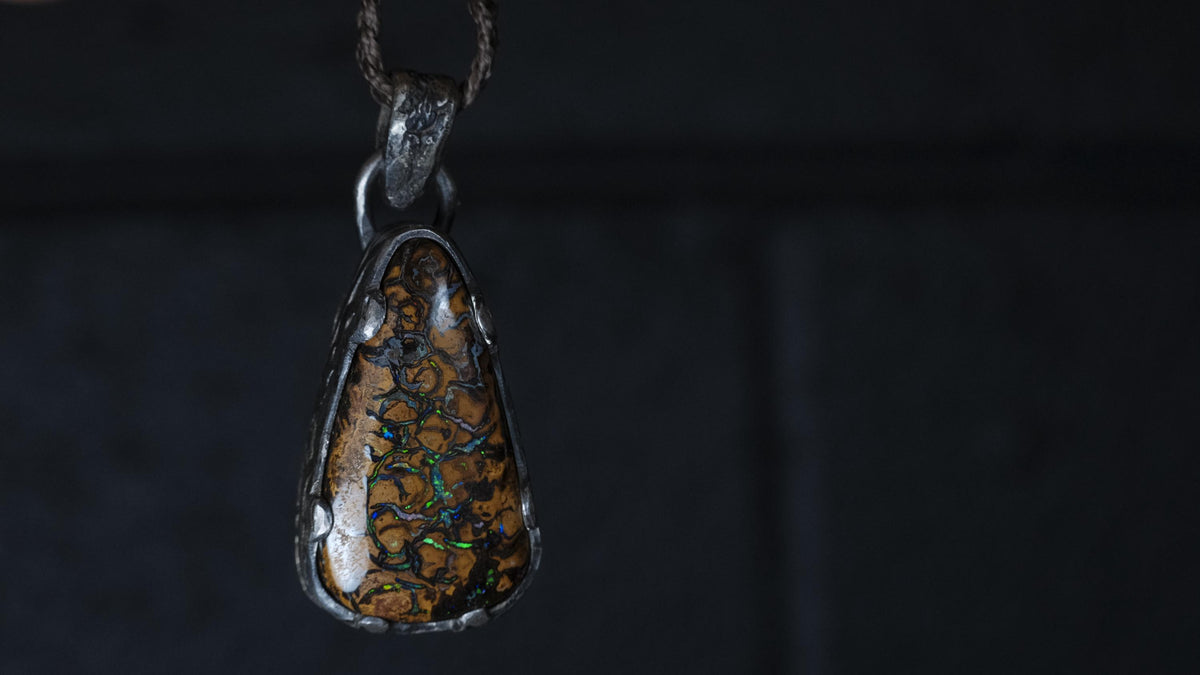 Australian Yowah matrix boulder opal pendant in textured sterling silver