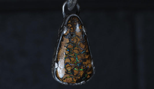 Australian Yowah matrix boulder opal pendant in textured sterling silver