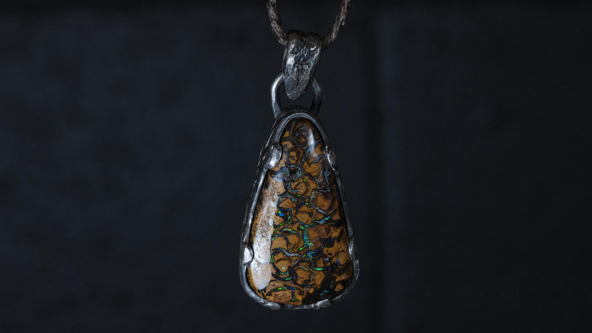 Blue flash Yowah matrix boulder opal pendant detail