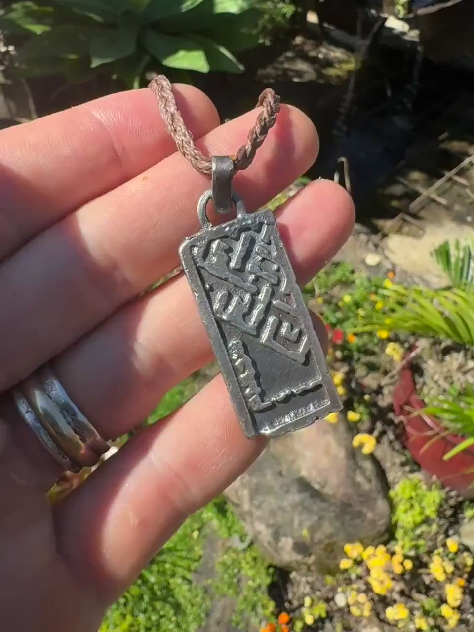 The Endless Knot or Shrivatsa Temple Relic Talisman Pendant in Sterling Silver on Adjustable Cord